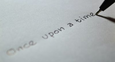 short story competitions | the words once upon a time are written on a piece of paper